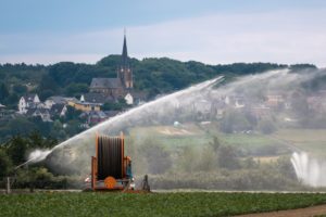 Pumping water for irrigation, with drip line roll